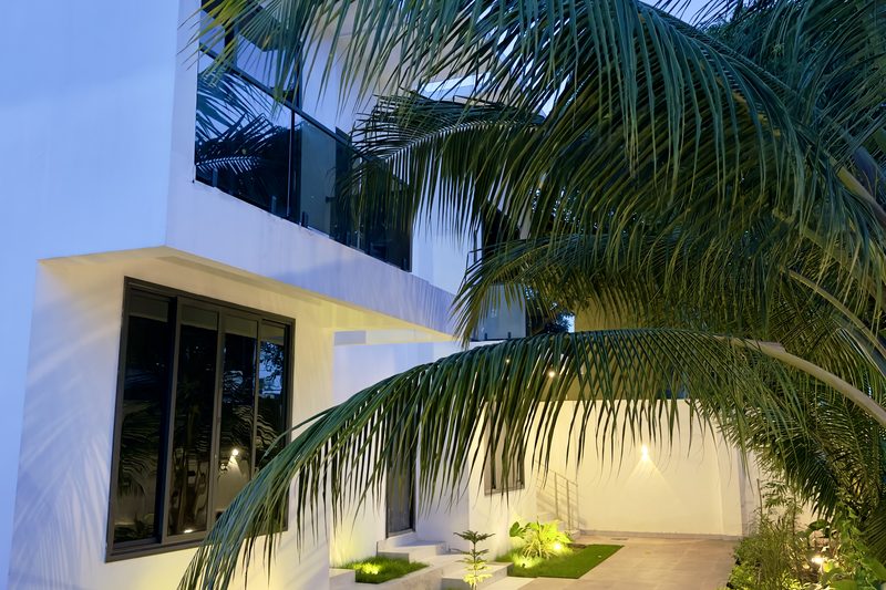 Evening view of the building and garden walkway